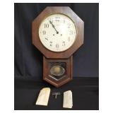 Vintage Howard Miller wood wall clock