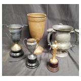 Group of pewter, silver plated and copper trophies