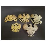 Group of military helmet emblems