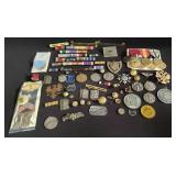 Group of military pins, ribbons, and buttons