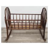 Vintage spindle rocking cradle