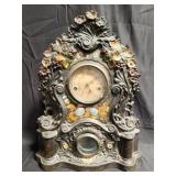 Antique metal and wood floral clock with mother