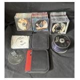 Large group of DVDs action packed films TV shows