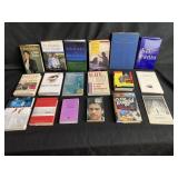 Group of signed books. Note: we do not