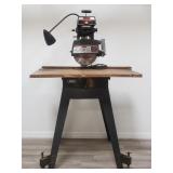 Craftsman 10" Radial Saw mounted on rolling