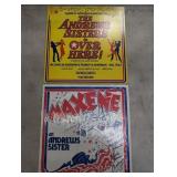 Pair of autographed Maxene Andrews vinyl records.