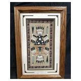 Framed Native American sand art titled "Father