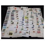 100+ vintage stamped first day covers. In case