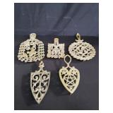 Group of brass trivets
