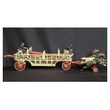 Vintage cast iron horse-drawn fire wagon