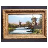 Reverse painting landscape with windmills