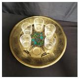 Brass serving dish with glasses