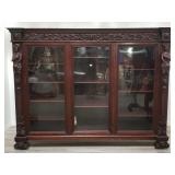 Antique highly carved 3 door bookshelf w/wavy