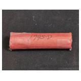 Roll of 1945-D Lincoln Wheat Cent coins. In case