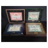 Group of 4 framed stock certificates