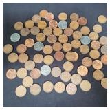 Group of wheat pennies and steel pennies