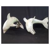 Pair of metal dolphin sculptures (slightly