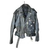 Vintage leather motorcycle jacket with Harley pins