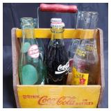 Vintage coca-cola crate with two unopen bottles