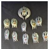 11 vintage silver pendants