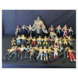 Large group of WWE action figures in box