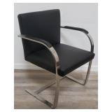 Faux leather & chrome arm chair