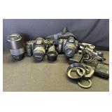 Pair of Canon & Nikon cameras with accessories