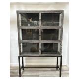 HD Buttercup Brenton cabinet on black metal stand