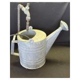 Vintage watering can fountain