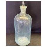 Vintage apothecary glass bottle