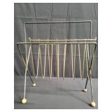 Vintage brass and iron magazine rack