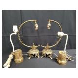 Group of gilt wood and brass lamps