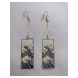 Gold tone wave earrings