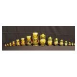 Pair of vintage hand painted Russian nesting dolls