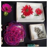 Group of custom jewelry necklaces, pins, etc