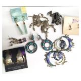Group of sterling silver earrings and brooches