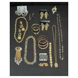 Group of costume jewelry in flat box lot