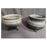 Pair of cast iron cauldrons
