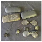 Pair of antique glasses with 3 cases