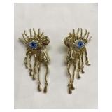Gold tone eyes earrings