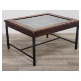 Carved wood & iron coffee table w/glass insert