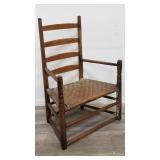 Vintage ladder back woven arm chair