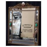 Vintage ornate brass wall mirror with porcelain