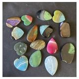 Group of 15 stone pendants