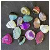 Group of 15 stone pendants