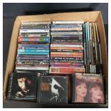 Group of dvds and cds