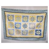 Handmade quilt made by 64"x 93" Nanci