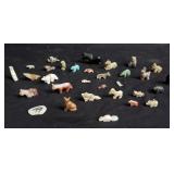 Group of carved stone animal figurines etc