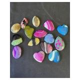 Group of 15 stone pendants