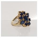14k gold ring with blue topaz